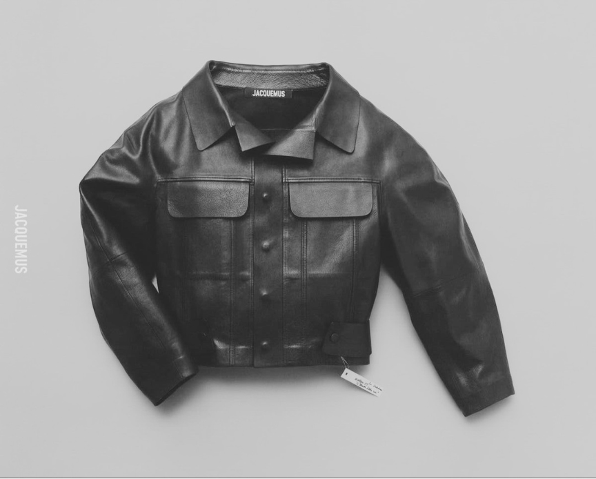 Black leather jacket, flat lay